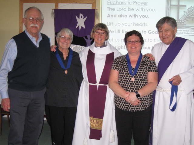 Lay Readers in Training <br> On Sunday March 18th, 2018 Lay Reader Medallions were presented to Jackie Snair and Lyda Miller, Cheryl Myles was not in attendance. <br> Pictured is Licensed Lay Reader Jerry Cavanaugh, Jackie Snair, Reverend Laurie Omstead, Lyda Miller and Reverend Bill MacDonald.